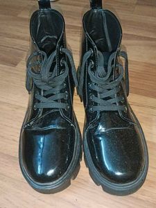 Glossy Black Lace-Up Boots