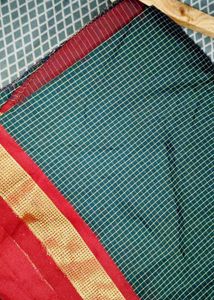 Elegant Green Saree with Red Border