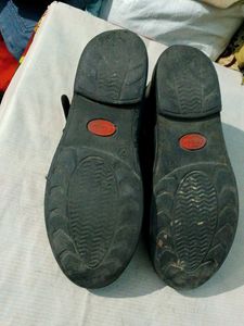 Worn Black Flats