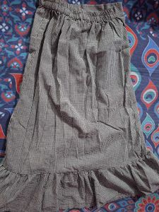 Black and white checked skirt.