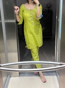 Beautiful Green Kurta and Pant with matching Potli