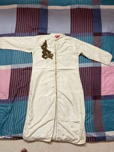 Elegant Cream Kurta with Embellishment