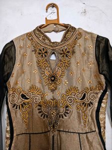 Elegant Beige Embroidered Anarkali Gown