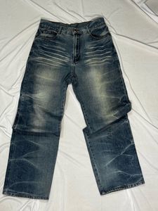 Distressed Blue Denim Jeans