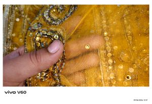 Stunning Yellow Embroidered Kundan Saree