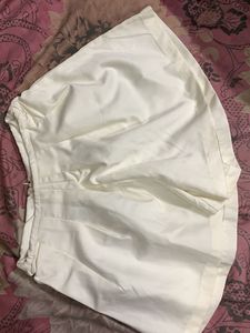 Cream High-Waisted Pleated Shorts