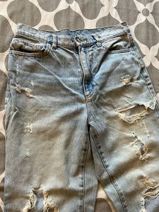 Distressed Light Wash Denim Jeans