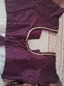 Elegant Purple Saree with Intricate Gold Weave