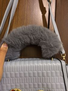 :Elegant blue Quilted Sling Bag with Faux Fur Hand