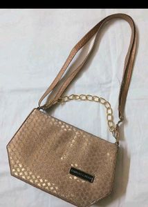 Chic Rose Gold Shoulder Bag with Chain Accent