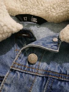 Distressed Denim Jacket with Sherpa Collar