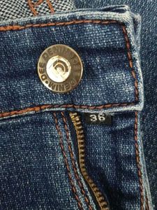 Distressed Blue Jeans