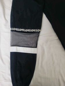 Graphic letter mesh panel joggers