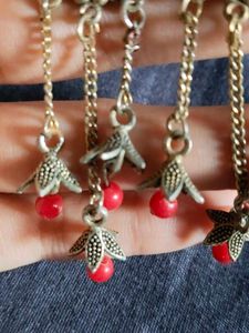 women earrings with red beads hanging