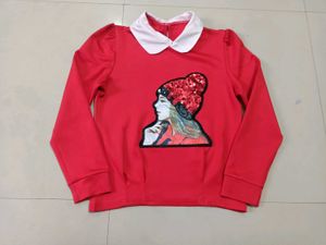 Chic Red Top with Sequin Embellishment