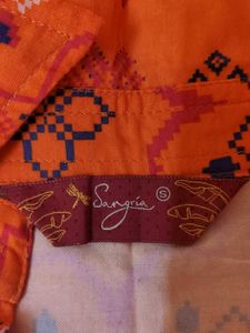 orange long shirt