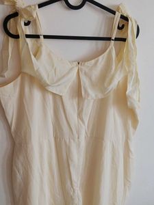 Cream Off-Shoulder Jumpsuit with Tie-Up Sleeves