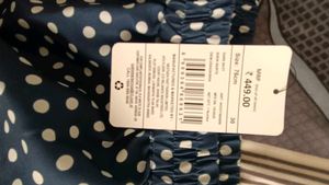 Polka Dot Mini Skirt with Ruffle Detail