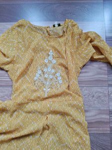 Elegant Yellow Kurta with White Embroidery