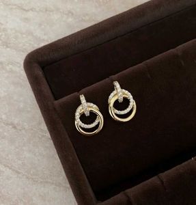 Elegant Circular Gold Stud Earrings! 🌟