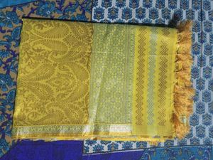 Elegant Yellow Saree with Tassels
