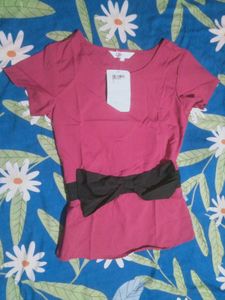 Chic Pink Top with Black Bow Accent