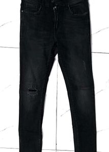 Distressed Black Skinny Jeans