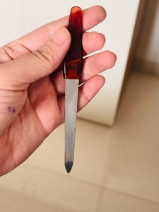 Nail File with Red Handle