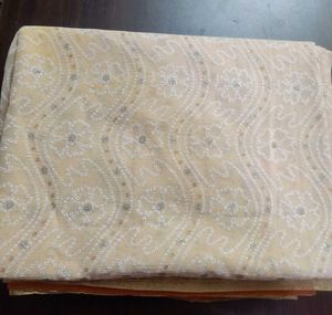Elegant Cream Bandhani Saree