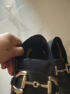 Classic Black Loafers with Gold Buckle