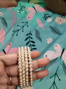 Elegant Pearl & Gold Bangles