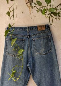 Distressed Blue Denim Jeans