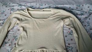 Cream Ribbed Bell Sleeve Peplum Top