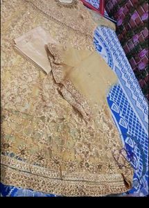 unstitched Elegant Golden Anarkali Suit