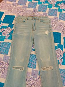 Ripped Bell Bottom Denim Jeans