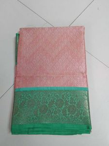 Elite orange green saree...