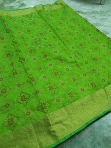 Vibrant Green Saree with Golden Border