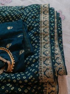 Beautiful Teal Saree with Golden Border