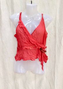 I. Chic Coral Wrap Top