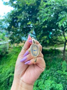 Elegant Gold Oval Bangle Watch
