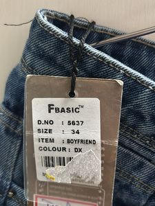 Distressed Blue Denim Jeans