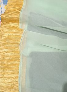 light blue colour fully stitched skirt with golden border in bottom and and work in flair .