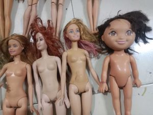 Used Defective Barbie dolls