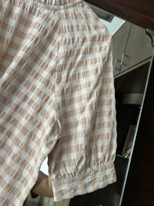 Chic Checkered Top with Ruffled Neck