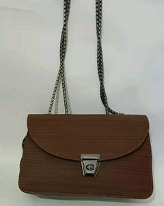 BROWN SOLID BUCKLE CHAIN SLING BAG (TOTALLY NEW)