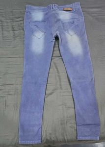 Light Wash Distressed Denim Jeans