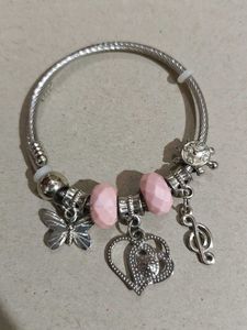 Charming Silver Charm Bracelet with Pink Beads