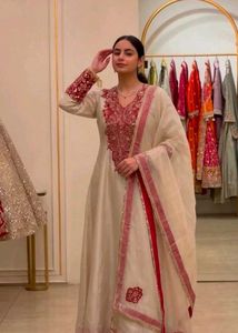 Elegant Cream Kurta Set with Red Embellishments