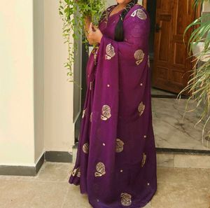 Beautiful Purple Saree with Golden Motifs