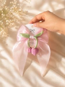 Cute Pink Bow Hair Clip with Tulip Charms
